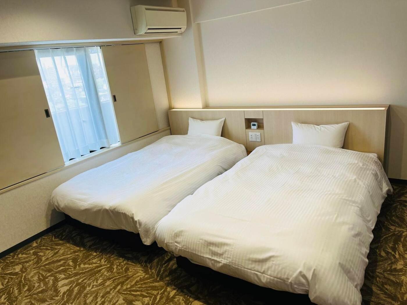 Hotel Alpha Inn Акита Номер фото