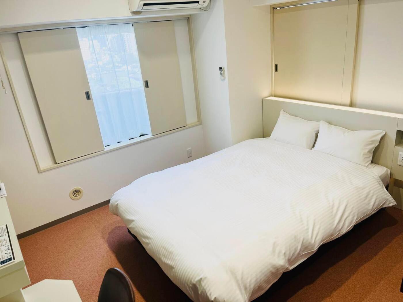 Hotel Alpha Inn Акита Номер фото