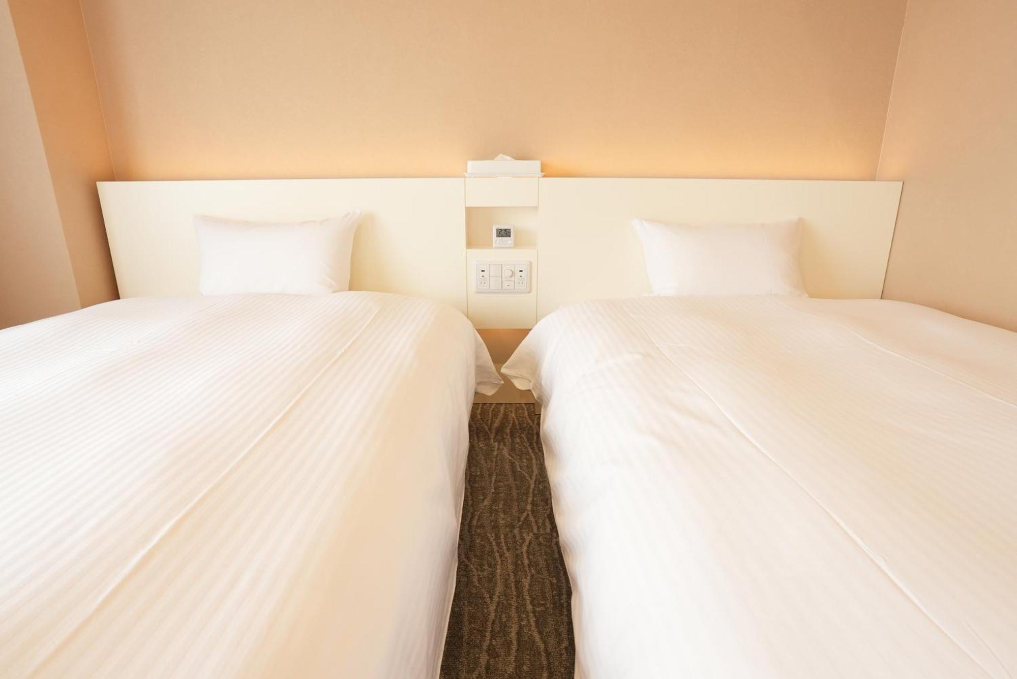 Hotel Alpha Inn Акита Номер фото