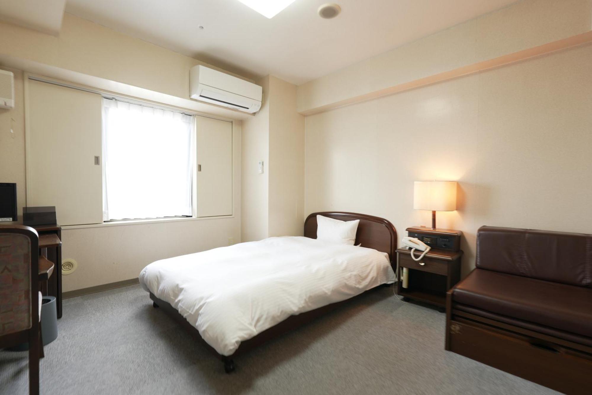 Hotel Alpha Inn Акита Номер фото