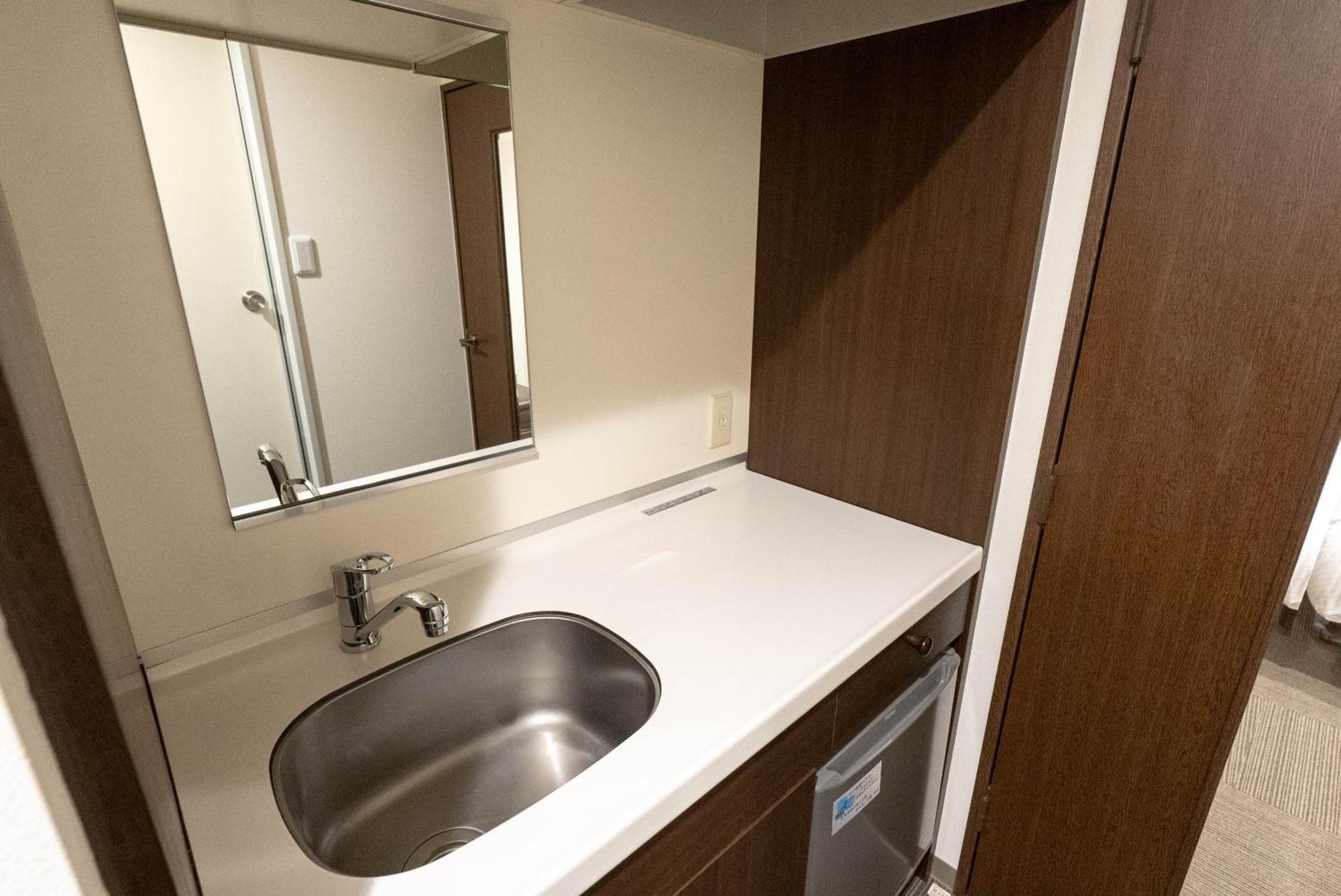 Hotel Alpha Inn Акита Номер фото