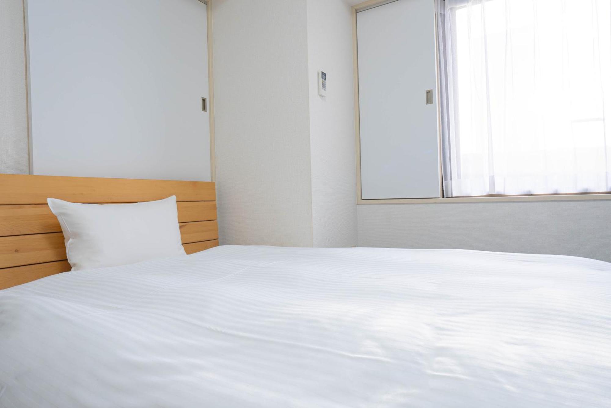 Hotel Alpha Inn Акита Экстерьер фото